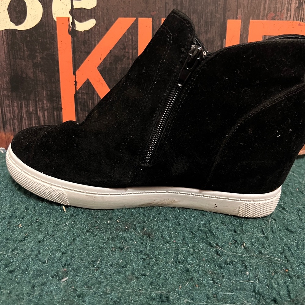 High top black wedges.